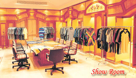 Eswari show room with garment rails and a meeting table